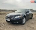 Черный Тойота Камри, объемом двигателя 2.4 л и пробегом 320 тыс. км за 10000 $, фото 1 на Automoto.ua