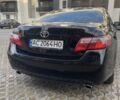 Черный Тойота Камри, объемом двигателя 3.5 л и пробегом 300 тыс. км за 7000 $, фото 1 на Automoto.ua