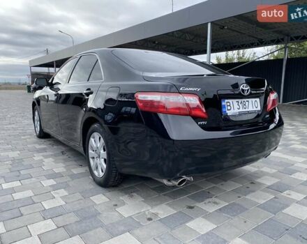 Чорний Тойота Камрі, об'ємом двигуна 3.46 л та пробігом 336 тис. км за 8900 $, фото 9 на Automoto.ua