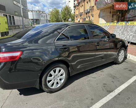 Черный Тойота Камри, объемом двигателя 2.4 л и пробегом 306 тыс. км за 10500 $, фото 1 на Automoto.ua