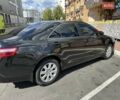 Черный Тойота Камри, объемом двигателя 2.4 л и пробегом 306 тыс. км за 10500 $, фото 1 на Automoto.ua