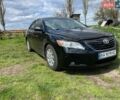 Черный Тойота Камри, объемом двигателя 3.46 л и пробегом 247 тыс. км за 8900 $, фото 1 на Automoto.ua