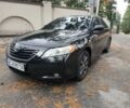 Черный Тойота Камри, объемом двигателя 2.4 л и пробегом 390 тыс. км за 6195 $, фото 1 на Automoto.ua