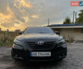 Черный Тойота Камри, объемом двигателя 2.36 л и пробегом 297 тыс. км за 8200 $, фото 1 на Automoto.ua