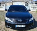 Чорний Тойота Камрі, об'ємом двигуна 2.4 л та пробігом 218 тис. км за 7300 $, фото 1 на Automoto.ua
