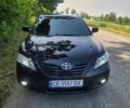 Черный Тойота Камри, объемом двигателя 3.5 л и пробегом 200 тыс. км за 11800 $, фото 1 на Automoto.ua