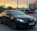 Черный Тойота Камри, объемом двигателя 2.4 л и пробегом 249 тыс. км за 8990 $, фото 1 на Automoto.ua