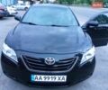 Черный Тойота Камри, объемом двигателя 2.4 л и пробегом 300 тыс. км за 7900 $, фото 1 на Automoto.ua