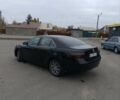 Черный Тойота Камри, объемом двигателя 2.4 л и пробегом 325 тыс. км за 7300 $, фото 18 на Automoto.ua