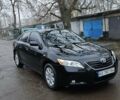 Черный Тойота Камри, объемом двигателя 2.36 л и пробегом 183 тыс. км за 7300 $, фото 1 на Automoto.ua