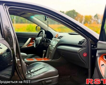 Черный Тойота Камри, объемом двигателя 2.4 л и пробегом 343 тыс. км за 8500 $, фото 9 на Automoto.ua