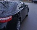 Черный Тойота Камри, объемом двигателя 2.36 л и пробегом 205 тыс. км за 8100 $, фото 3 на Automoto.ua