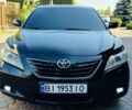 Черный Тойота Камри, объемом двигателя 3.5 л и пробегом 200 тыс. км за 7500 $, фото 1 на Automoto.ua