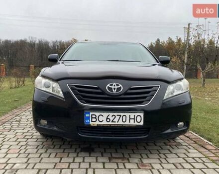 Черный Тойота Камри, объемом двигателя 2.4 л и пробегом 227 тыс. км за 8600 $, фото 19 на Automoto.ua