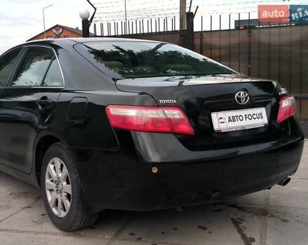Черный Тойота Камри, объемом двигателя 2.4 л и пробегом 304 тыс. км за 6990 $, фото 7 на Automoto.ua