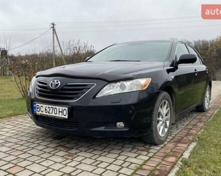 Черный Тойота Камри, объемом двигателя 2.4 л и пробегом 227 тыс. км за 8600 $, фото 18 на Automoto.ua