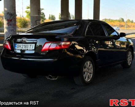 Черный Тойота Камри, объемом двигателя 2.4 л и пробегом 140 тыс. км за 8000 $, фото 4 на Automoto.ua