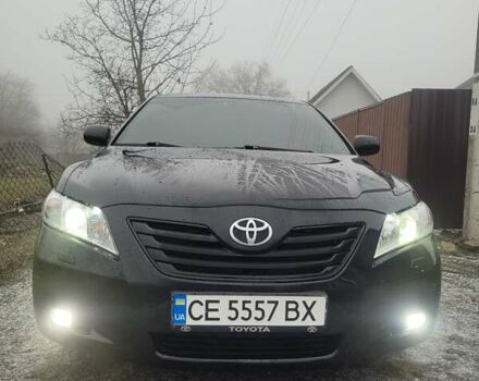 Черный Тойота Камри, объемом двигателя 3.5 л и пробегом 255 тыс. км за 11800 $, фото 22 на Automoto.ua