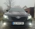 Черный Тойота Камри, объемом двигателя 3.5 л и пробегом 255 тыс. км за 11800 $, фото 22 на Automoto.ua