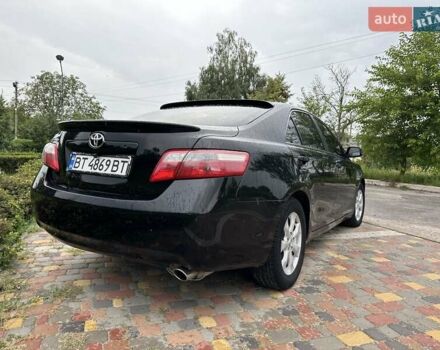 Черный Тойота Камри, объемом двигателя 2.4 л и пробегом 146 тыс. км за 9500 $, фото 3 на Automoto.ua