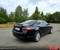 Черный Тойота Камри, объемом двигателя 2.4 л и пробегом 290 тыс. км за 8500 $, фото 1 на Automoto.ua