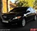 Черный Тойота Камри, объемом двигателя 2.4 л и пробегом 140 тыс. км за 8000 $, фото 1 на Automoto.ua