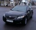 Черный Тойота Камри, объемом двигателя 2.36 л и пробегом 205 тыс. км за 8100 $, фото 1 на Automoto.ua