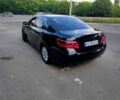 Черный Тойота Камри, объемом двигателя 2.4 л и пробегом 300 тыс. км за 7800 $, фото 2 на Automoto.ua