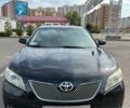 Черный Тойота Камри, объемом двигателя 2.4 л и пробегом 10 тыс. км за 7200 $, фото 1 на Automoto.ua
