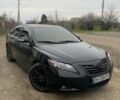 Черный Тойота Камри, объемом двигателя 2.4 л и пробегом 214 тыс. км за 7200 $, фото 1 на Automoto.ua