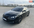 Черный Тойота Камри, объемом двигателя 3.5 л и пробегом 380 тыс. км за 8500 $, фото 1 на Automoto.ua