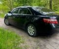 Черный Тойота Камри, объемом двигателя 2.4 л и пробегом 320 тыс. км за 7500 $, фото 1 на Automoto.ua