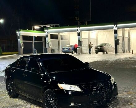 Черный Тойота Камри, объемом двигателя 2.4 л и пробегом 330 тыс. км за 8500 $, фото 1 на Automoto.ua