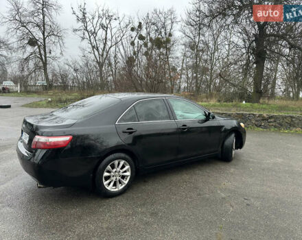Черный Тойота Камри, объемом двигателя 2.4 л и пробегом 232 тыс. км за 6850 $, фото 7 на Automoto.ua