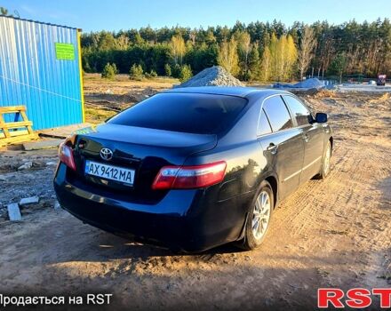 Черный Тойота Камри, объемом двигателя 2.4 л и пробегом 220 тыс. км за 8500 $, фото 1 на Automoto.ua