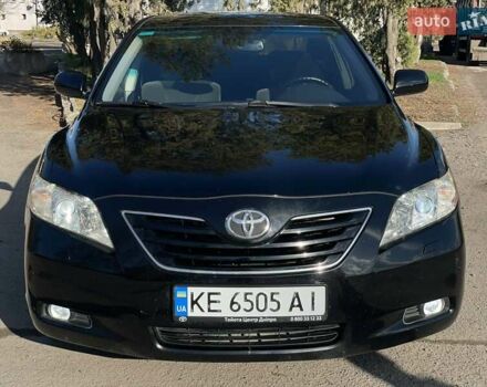 Черный Тойота Камри, объемом двигателя 2.4 л и пробегом 244 тыс. км за 8700 $, фото 1 на Automoto.ua