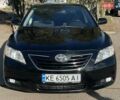 Черный Тойота Камри, объемом двигателя 2.4 л и пробегом 244 тыс. км за 8700 $, фото 1 на Automoto.ua