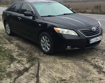 Черный Тойота Камри, объемом двигателя 2.4 л и пробегом 363 тыс. км за 6500 $, фото 1 на Automoto.ua