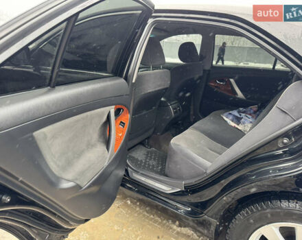 Чорний Тойота Камрі, об'ємом двигуна 2.4 л та пробігом 260 тис. км за 10500 $, фото 8 на Automoto.ua