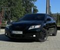 Чорний Тойота Камрі, об'ємом двигуна 2.4 л та пробігом 180 тис. км за 7995 $, фото 1 на Automoto.ua