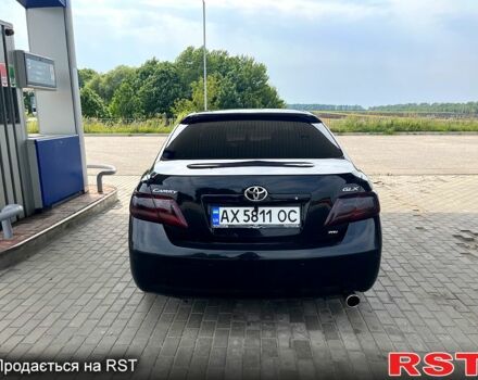 Черный Тойота Камри, объемом двигателя 2.4 л и пробегом 320 тыс. км за 8000 $, фото 2 на Automoto.ua