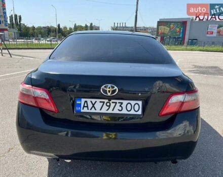 Черный Тойота Камри, объемом двигателя 2.36 л и пробегом 260 тыс. км за 8800 $, фото 12 на Automoto.ua