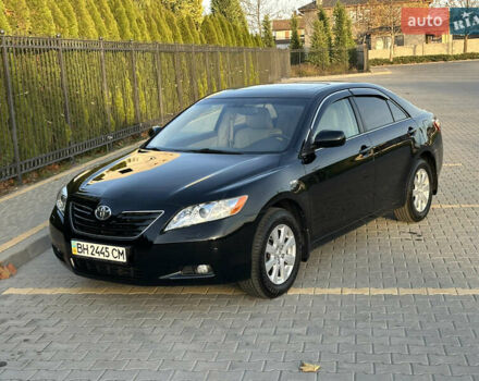 Черный Тойота Камри, объемом двигателя 2.4 л и пробегом 134 тыс. км за 11900 $, фото 1 на Automoto.ua