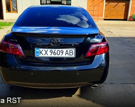 Черный Тойота Камри, объемом двигателя 2.4 л и пробегом 233 тыс. км за 8500 $, фото 4 на Automoto.ua