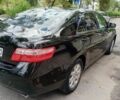 Чорний Тойота Камрі, об'ємом двигуна 2.4 л та пробігом 243 тис. км за 8300 $, фото 1 на Automoto.ua