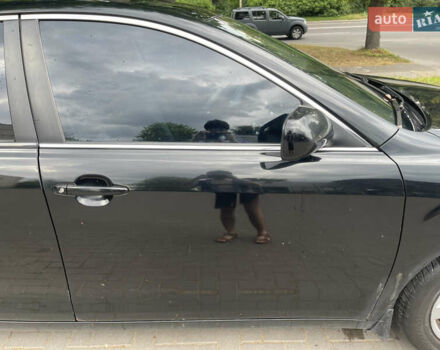 Чорний Тойота Камрі, об'ємом двигуна 2.4 л та пробігом 230 тис. км за 8499 $, фото 12 на Automoto.ua