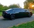 Чорний Тойота Камрі, об'ємом двигуна 2.4 л та пробігом 235 тис. км за 8700 $, фото 1 на Automoto.ua