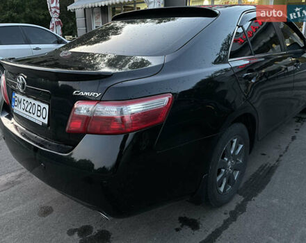 Черный Тойота Камри, объемом двигателя 2.36 л и пробегом 164 тыс. км за 8900 $, фото 1 на Automoto.ua