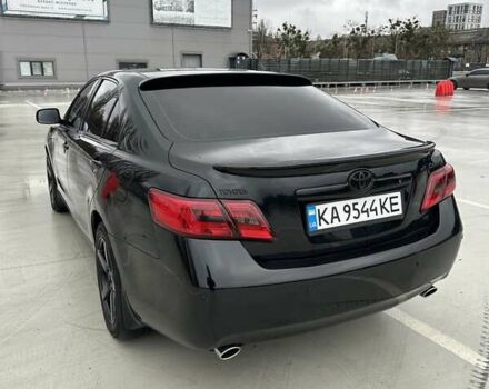 Черный Тойота Камри, объемом двигателя 3.46 л и пробегом 390 тыс. км за 11700 $, фото 1 на Automoto.ua