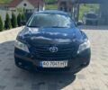 Чорний Тойота Камрі, об'ємом двигуна 2.4 л та пробігом 303 тис. км за 8500 $, фото 1 на Automoto.ua
